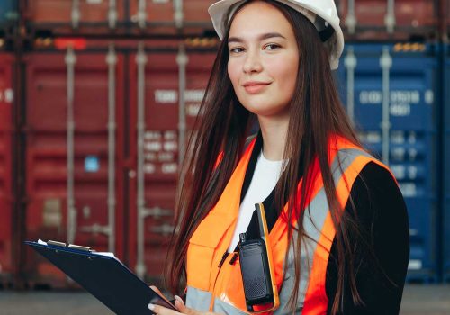 woman-works-in-international-shipping-area-export-2023-11-27-05-09-43-utc.jpg